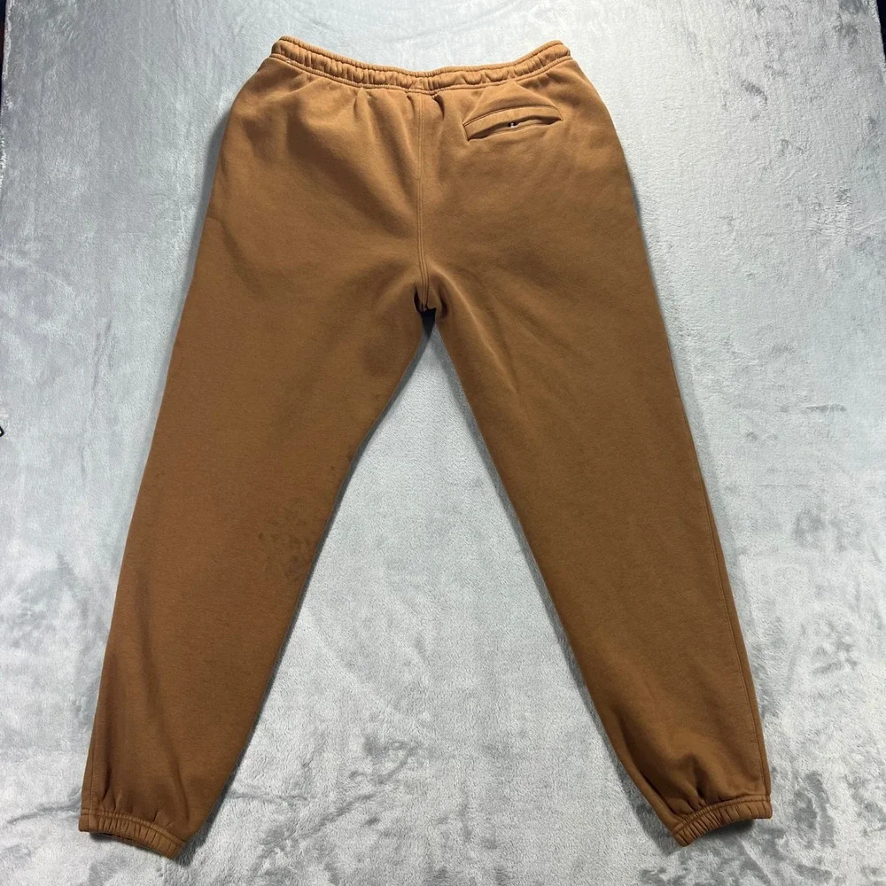 NIKE‎ Sportswear Club Cuffed Fleece Pants Mens Large Brown IM7828-235 Graphic